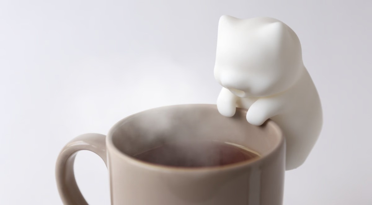 The tiny robot cat that cools your coffee